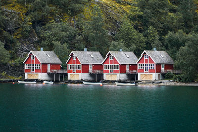 Four boathouses at the harbour of flåm. 