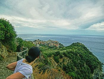 Scenic view of sea against cloudy sky