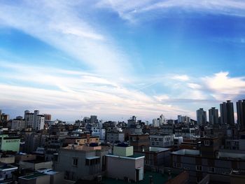 Cityscape against blue sky