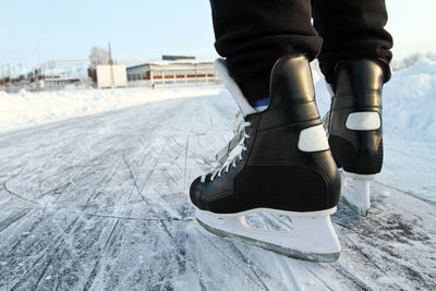 Low section of person ice-skating