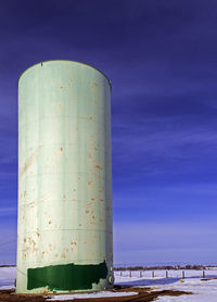 Low angle view of water tower against sky