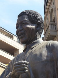 Low angle view of statue of historic building