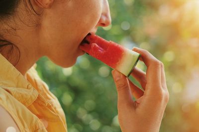 Close-up of woman eating ice cream