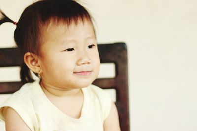 Portrait of cute boy looking away