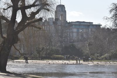 Scenic view of lake and buildings