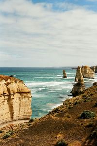 Scenic view of sea against cloudy sky