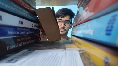 Portrait of young man using phone