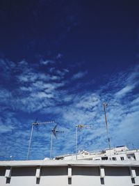 Low angle view of building against blue sky