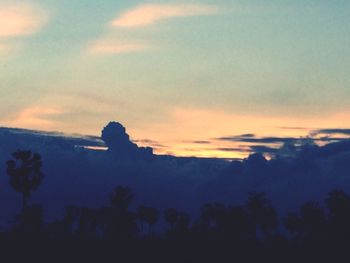 Scenic view of silhouette landscape against sky during sunset