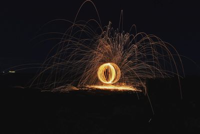 Light painting against clear sky at night