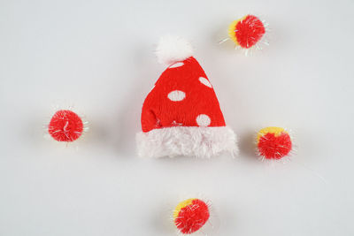 Close-up of christmas decorations on white background