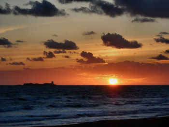 Scenic view of sea against sky during sunset