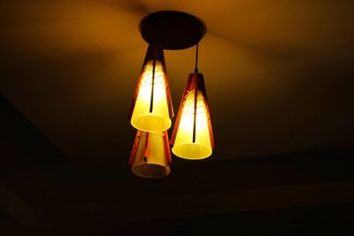 Low angle view of illuminated light bulb