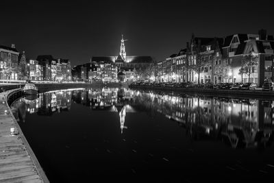 Reflection of illuminated buildings in water