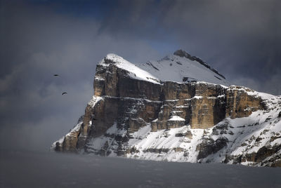 Low angle view of majestic mountain against sky