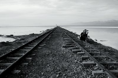 Train on railroad track against sky