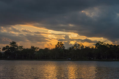 Scenic view of lake against sky during sunset