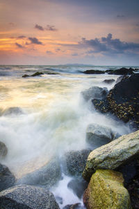 Scenic view of sea against sky during sunset