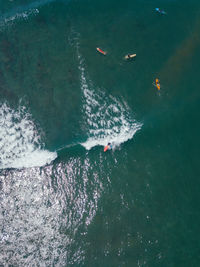 High angle view of people in sea