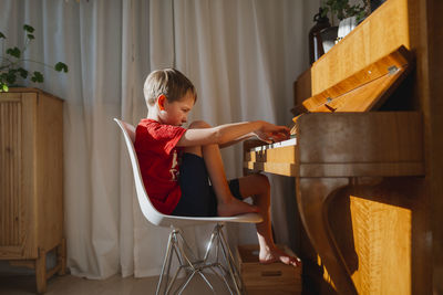 Boy playing piano