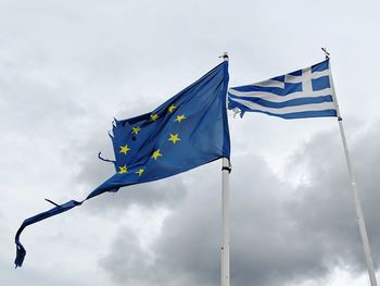 Low angle view of flag against sky