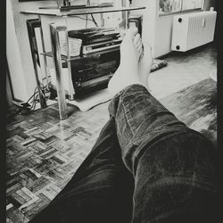 Close-up of cat relaxing on the wall