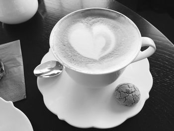 High angle view of coffee cup on table