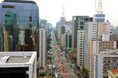 Buildings in city against sky