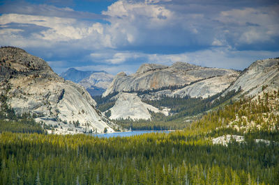 Scenic view of landscape and mountains against sky at yosemite national park