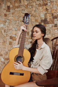 Young man playing guitar