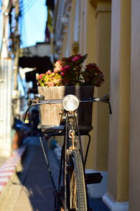 Close-up of bicycle on street