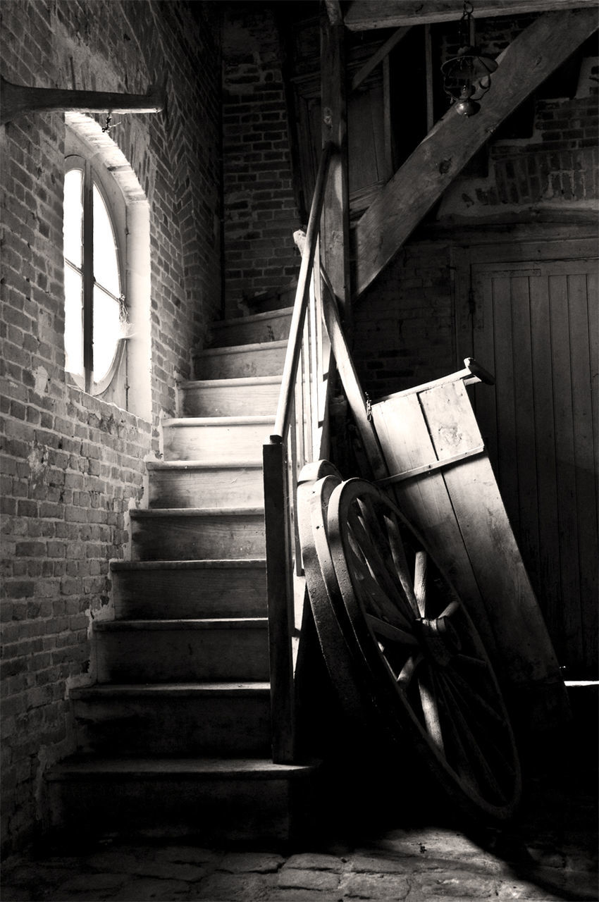 architecture, built structure, steps, steps and staircases, staircase, building exterior, railing, brick wall, abandoned, building, old, indoors, wall - building feature, house, low angle view, no people, sunlight, damaged, obsolete, day