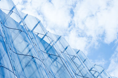 Low angle view of modern building against sky