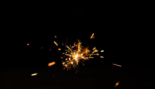 Firework display at night