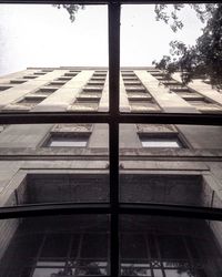 Low angle view of modern building against sky