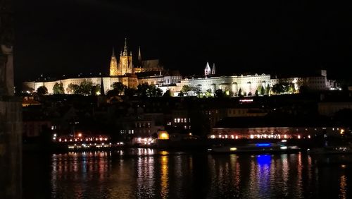 Illuminated buildings at waterfront