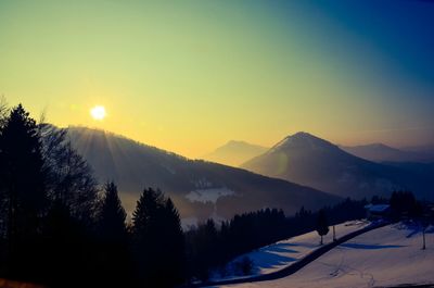 Scenic view of mountains at sunset