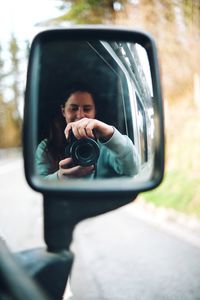 Reflection of road on side-view mirror