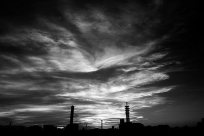 Low angle view of cloudy sky at sunset