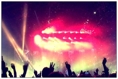 People enjoying at concert