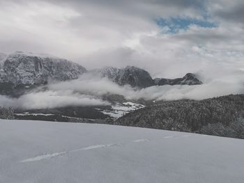 Scenic view of snowcapped mountains against sky