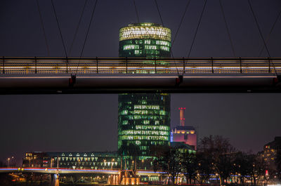 Illuminated city buildings at night