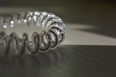 Close-up of wedding rings on table