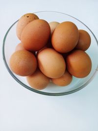 High angle view of eggs in plate