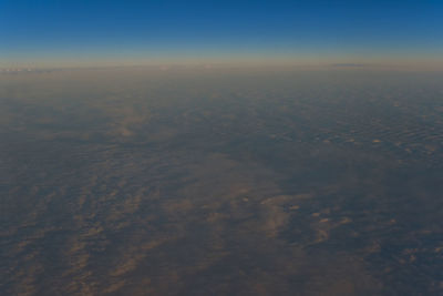 High angle view of land against sky