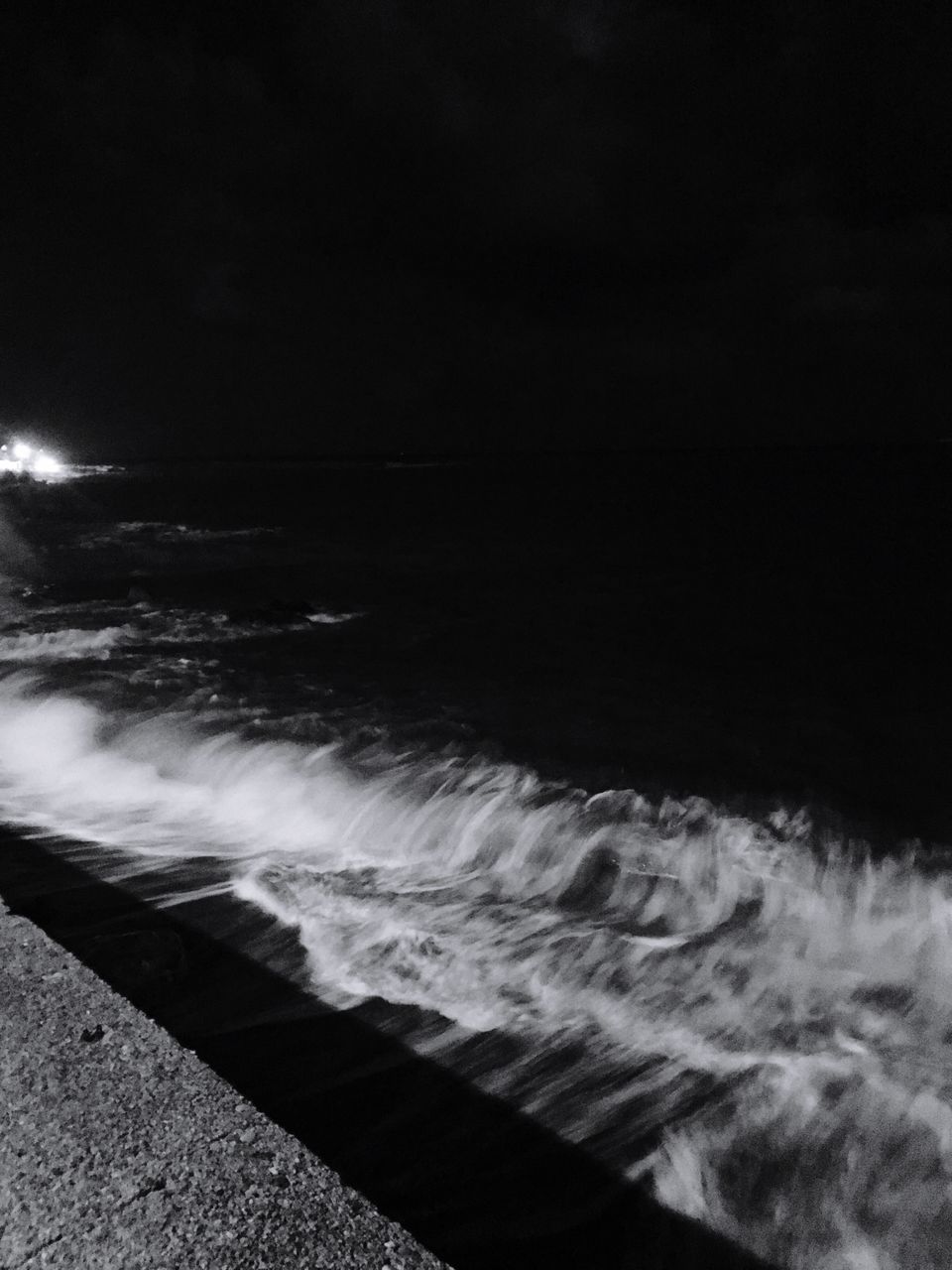 VIEW OF SEA AGAINST SKY AT NIGHT