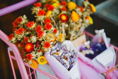 Midsection of woman holding bouquet