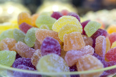 Close-up of multi colored candies in plate