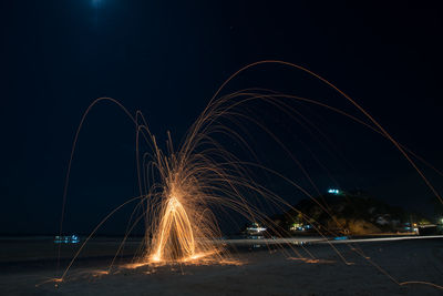 Firework display at night