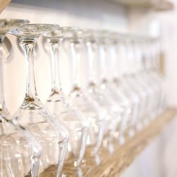 Close-up of empty glass bottles